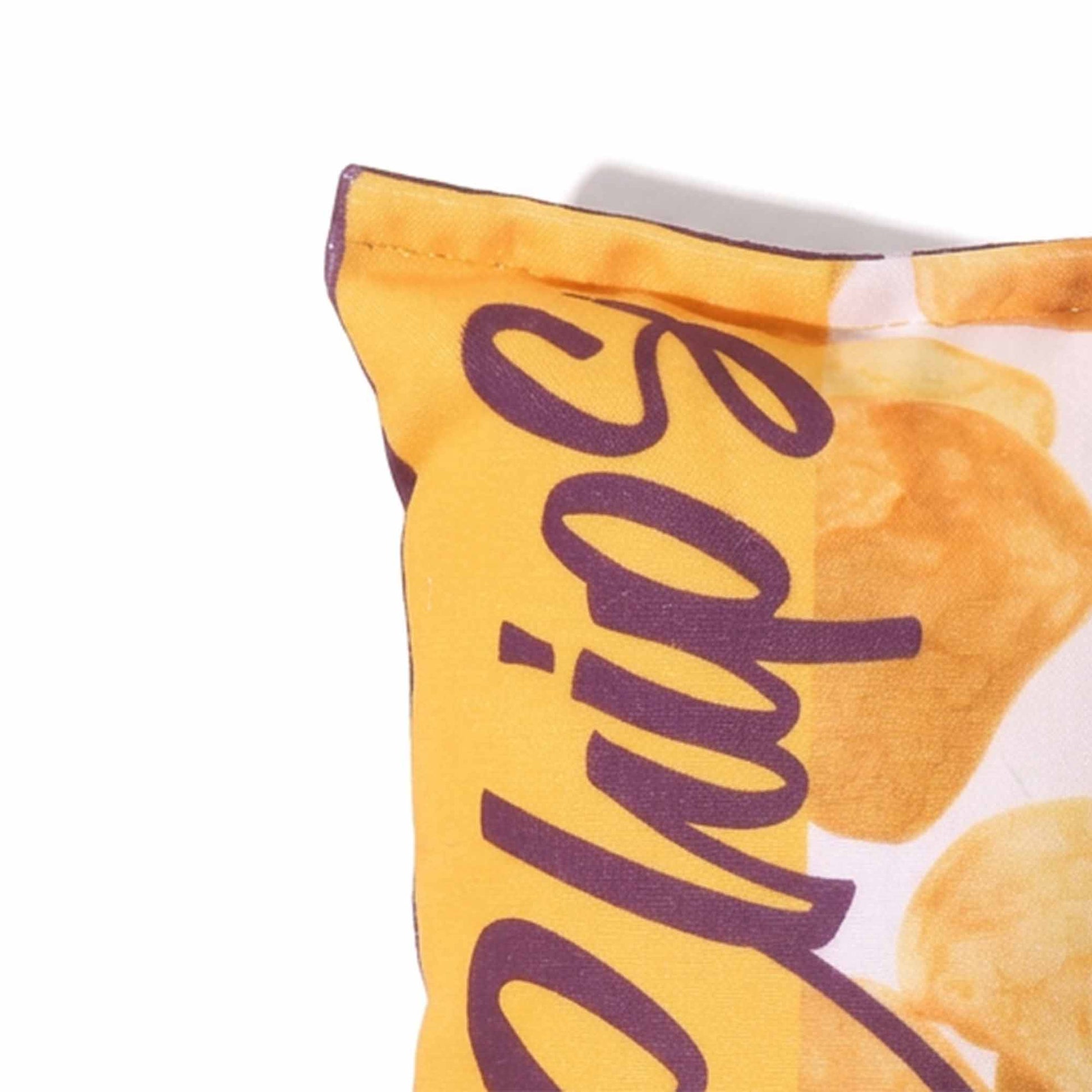 Close-up of yellow chips bag plush dog toy corner seam – detailed "Chips" text and potato chip print on soft polyester plush for squeaky play and snuggling by PetsFave